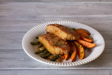 Honey garlic pork chops with asparagus and sweet potatoes