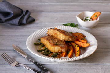 Honey garlic pork chops with asparagus and sweet potatoes