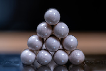 macro photography of Capsules with medicine on the table. Medical theme.