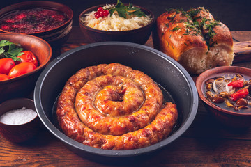 Ukrainian traditional cuisine. Fried home-made sausage.