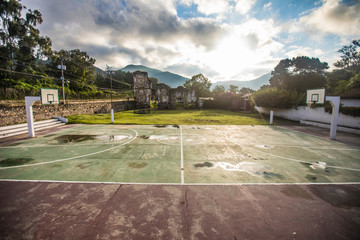 Basketball sports court adjacent to Colonia Candelaria in Antigua.