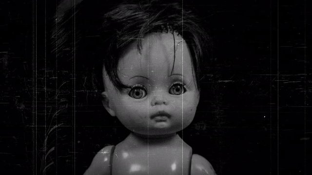 Zooming in and out to plastic doll