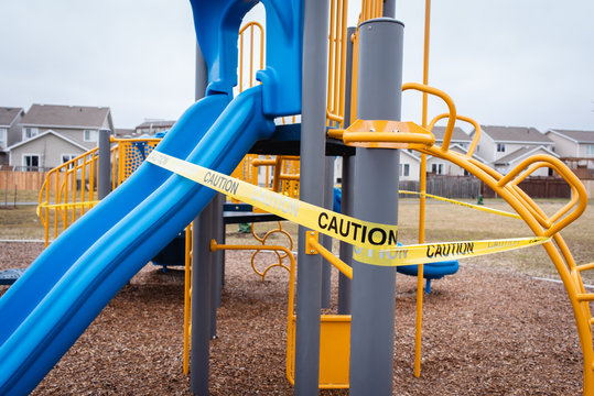 Playground Equipment Wrapped In Caution Tape During Covid 19 Pandemic.