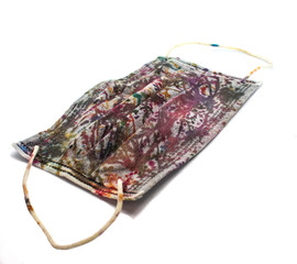 Painted medical protective mask on a white background