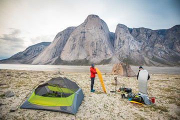 Climbers set up campsite, blow up air mattresses in Akshayak Pass