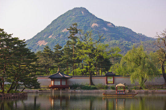 Photo of tea house and lake at the Royal palace Gyeongbokgung / Seoul