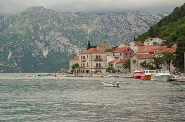 Shore of Perast. Cloudy day in the old town on the Bay of Kotor. Nature and travel. Montenegro,...
