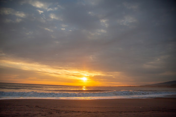 Naklejka na ściany i meble Sunset on the beach