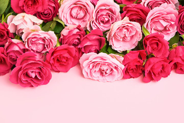 Pink roses bouquet on pink background. Mothers day, Valentines Day, Birthday celebration concept. Greeting card. Copy space