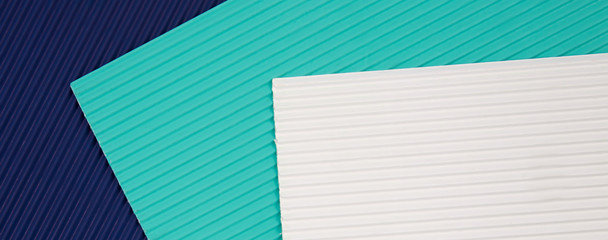 Texture of parallel lines, different colors, with space for text, flat lay. Banner
