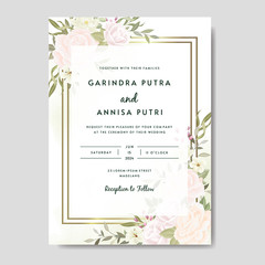 Elegant wedding invitation card with beautiful flower and leaves premium vector