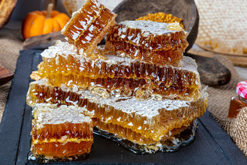 Closeup raw organic Honeycombs . Newly pulled honey bee honeycomb beeswax. Organic honeycomb...
