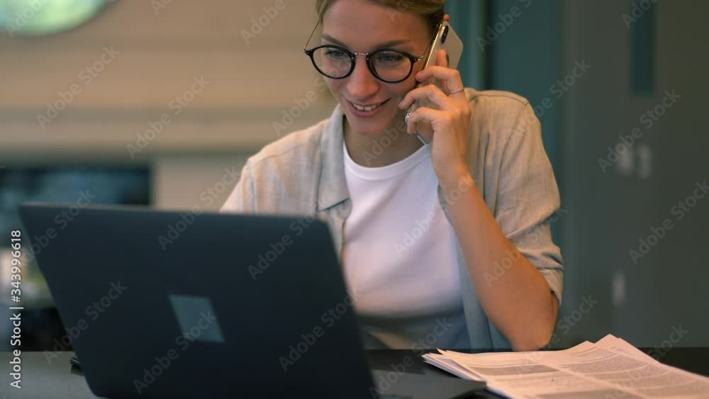 Aufkleber millennial woman in optical glasses browsing internet websites and making cellphone application for 