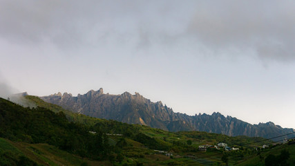 Clear peak view of Mount Kinabalu from Kundasang city in the morning after thick fog clear.