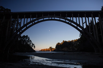 The Russian Gulch bridge is found just north of Mendocino Town in Northern California. The scenic bridge is easily seen from the Russian Gulch State Park.