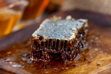 Closeup raw organic Honeycombs . Newly pulled honey bee honeycomb beeswax. Organic honeycomb...