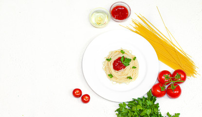 spaghetti on a plate with ketchup and herbs. pasta spaghetti with vegetables ketchup from vegetables Italian food healthy food. restaurant food concept. food for the menu. vegetarian