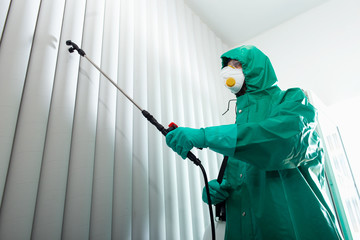 Man in hazmat suit during Coronavirus pandemic stock photo