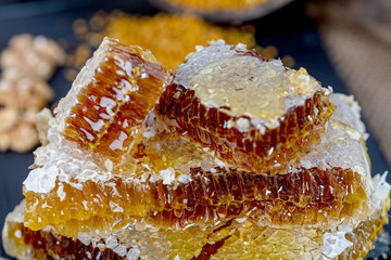 Closeup raw organic Honeycombs . Newly pulled honey bee honeycomb beeswax. Organic honeycomb...