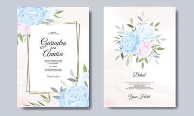 Elegant wedding invitation card with beautiful flower and leaves premium vector