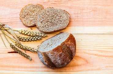 Fresh bread on a wooden table