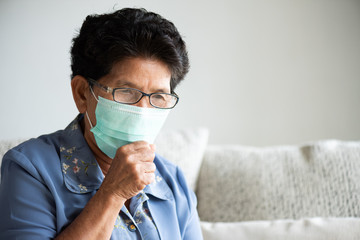 Sick asian old woman wearing Protective face mask, get ready for Coronavirus and pm 2.5 fighting,...