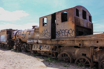 Fototapeta na wymiar old rusty train in the middle of the desert