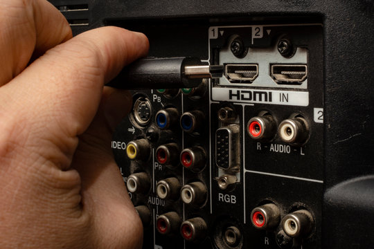 HDMI cable. Plug into the port, back of the TV. Technology. Connector to transmit high definition image.