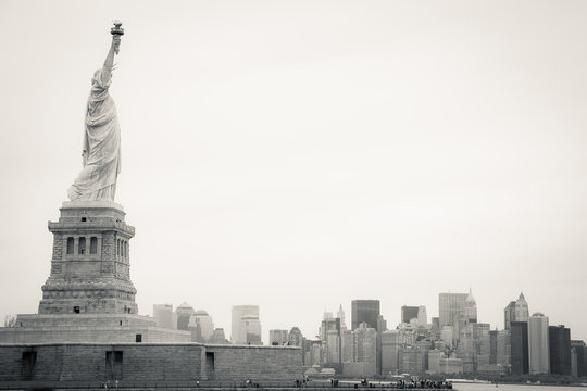 Black and white image of the Statue of Liberty.