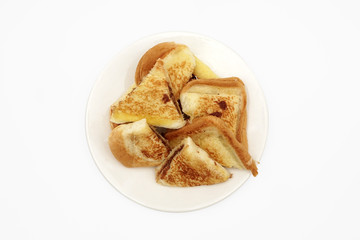 Delicious homemade toast top view isolated on white