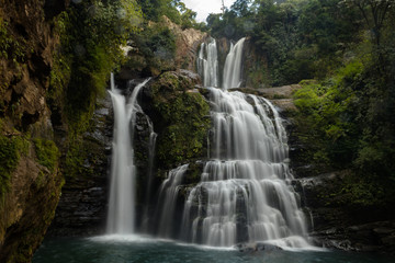 Waterfall in the forest. Nauyaca Waterfall, Costa Rica.
