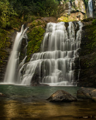 Fototapeta na wymiar Waterfall in the forest. Nauyaca Waterfall, Costa Rica.