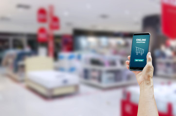 hold phone blur shopping mall