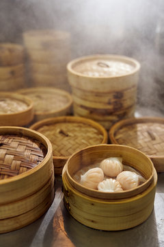 dim sum dumplings hargow in traditional bamboo steamers