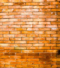 Colorful grungy brick wall background for use as a photo backdrop.