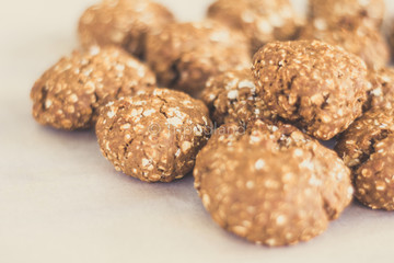 topview of homemade oat cookies on bakery paper