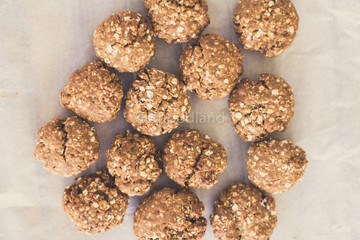 topview of homemade oat cookies on bakery paper