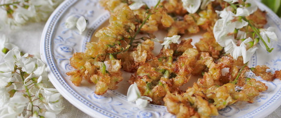 acacia flowers fried in batter. organic food from nature. natural habitat. Edible flowers. foraging. 