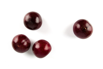 Fresh America red plum isolated on white background.