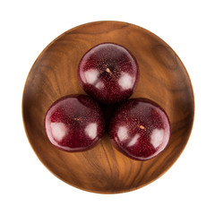 Fresh America red plum isolated on white background.
