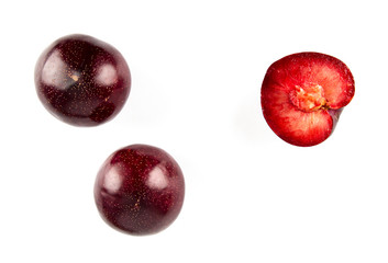 Fresh America red plum isolated on white background.