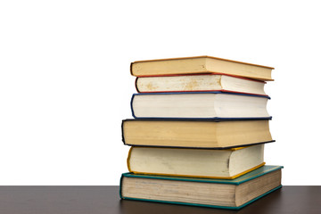 Stack of old books on shelf book on White background