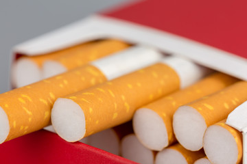 Close up cigarette in pack is addictive to be cancer.smoking reduction campaign in World No Tobacco Day.