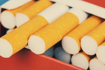 Close up cigarette in pack is addictive to be cancer.smoking reduction campaign in World No Tobacco Day.