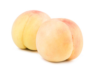 Fresh honey peach isolated on white background.