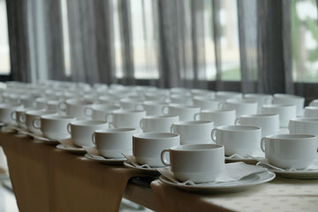 many  coffee cup set up for tea break in business meeting conference refreshing up afternoon