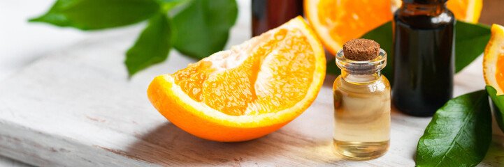 Concept of natural organic orange essential oil for skin face, body health care. Moisturizing,...