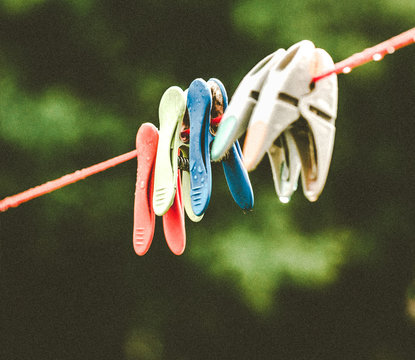 Close-up Of Clothespin Hanging On Clothesline