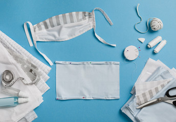 Sewing anti-virus face mask. Homemade mask. DIY face mask for safety at pandemic & quarantine. Zero waste handmade cotton natural mask against infection. Stay safe. Stop virus. Prevention measures