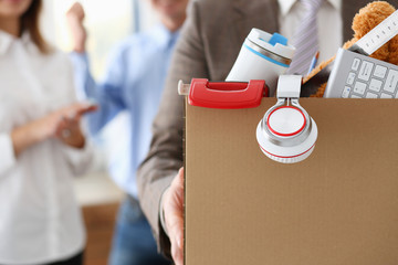 Angry yelling boss point arm to exit dismissing sad worker with stuff box portrait. Bad news pack...